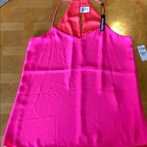 Express Tops - Pink reversible racerback cami NWT. Never worn. Express Tops - Pink reversible racerback cami NWT. Never worn.